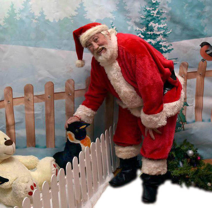 Santa with his polar penguin